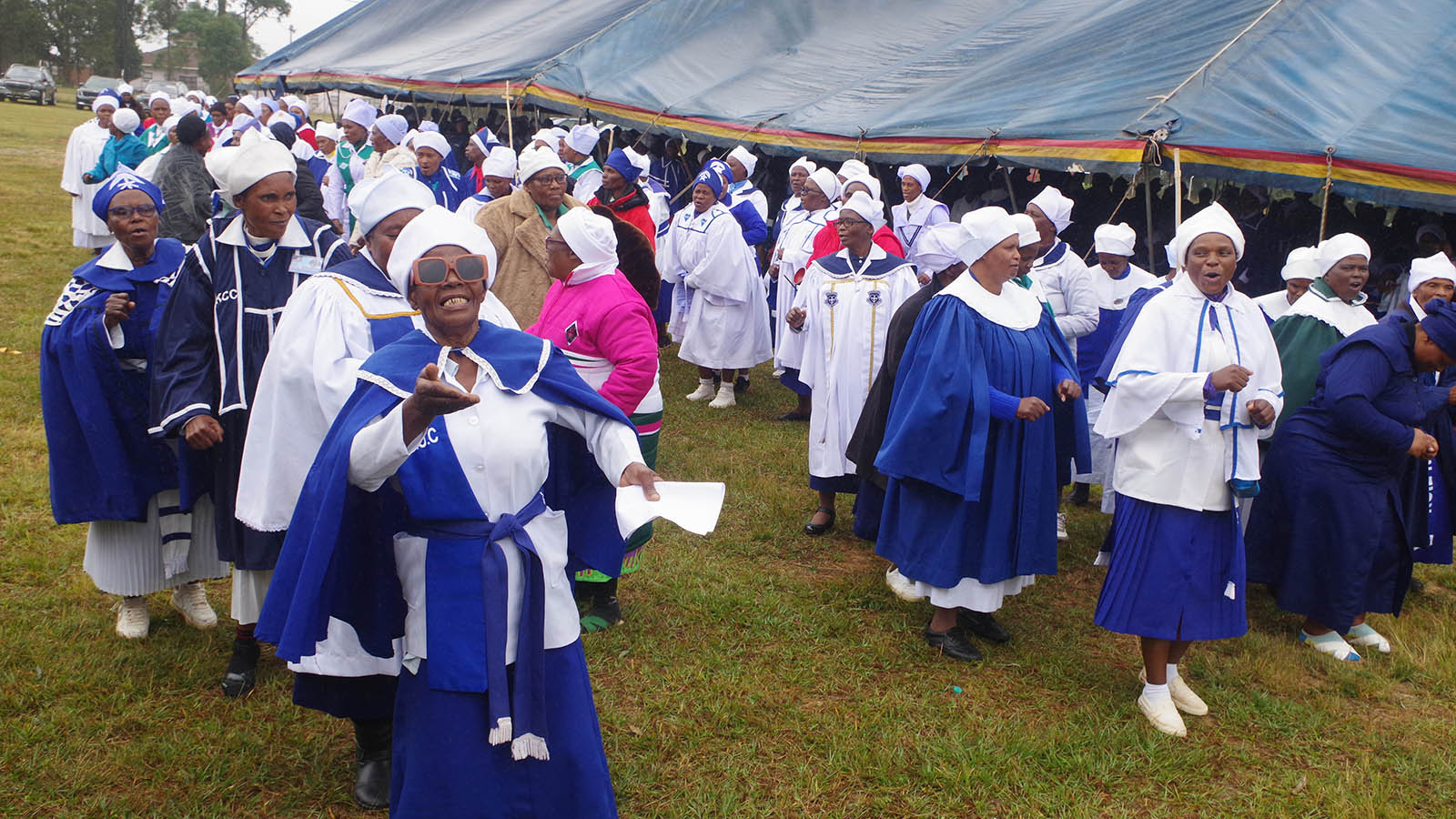 Congregants singing and dancing as they celebrate the ascension of Jesus Christ.
